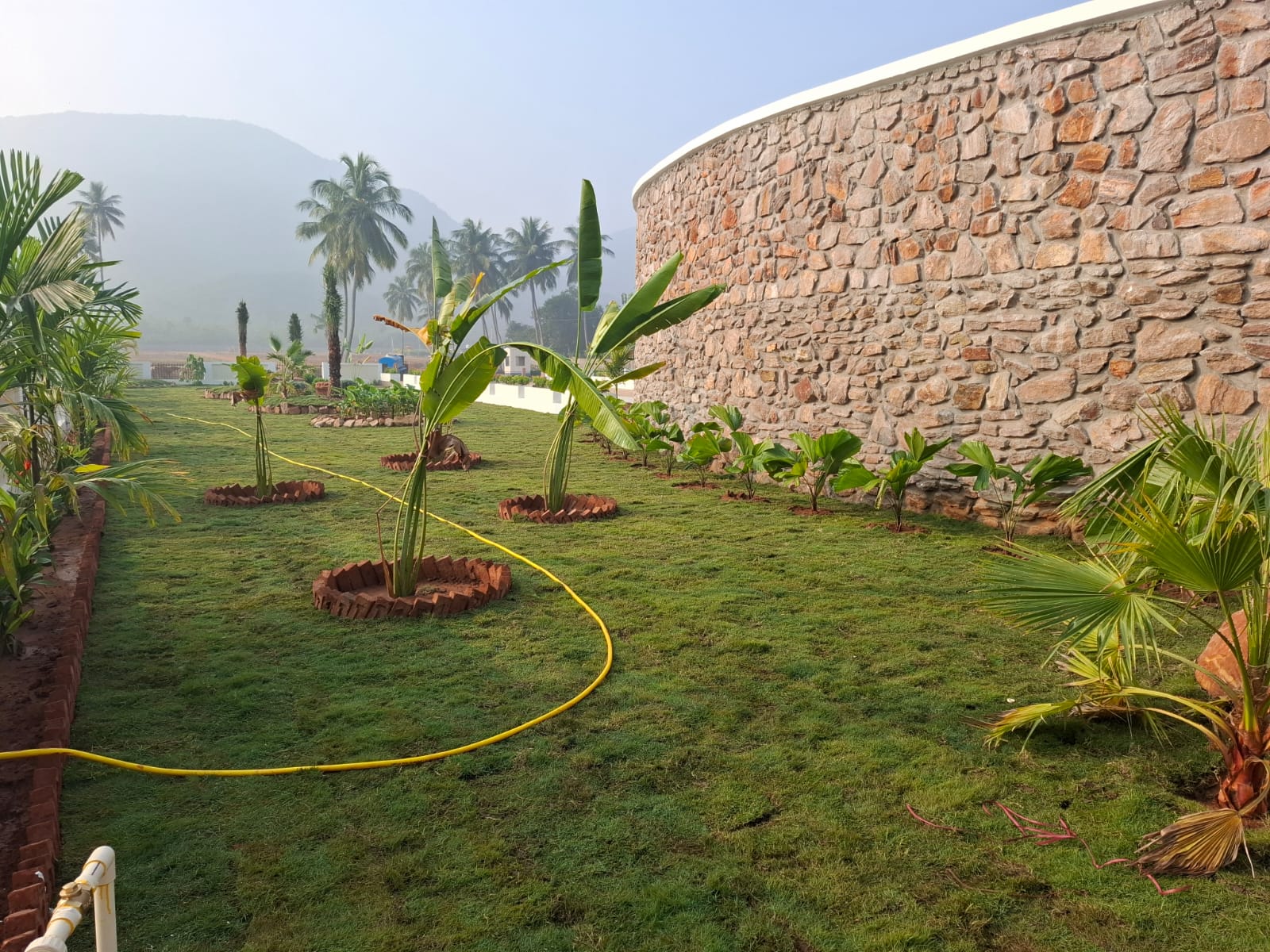 Stone wall with garden landscape